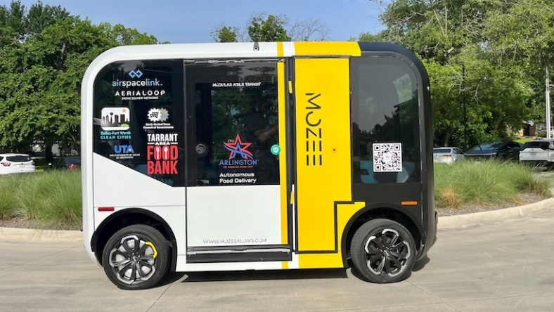Mozee autonomous electric shuttle vehicle operating on a public roadway