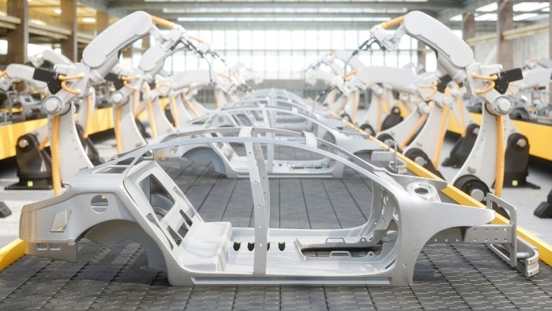 Industrial robots assembling automotive body frames in smart factory